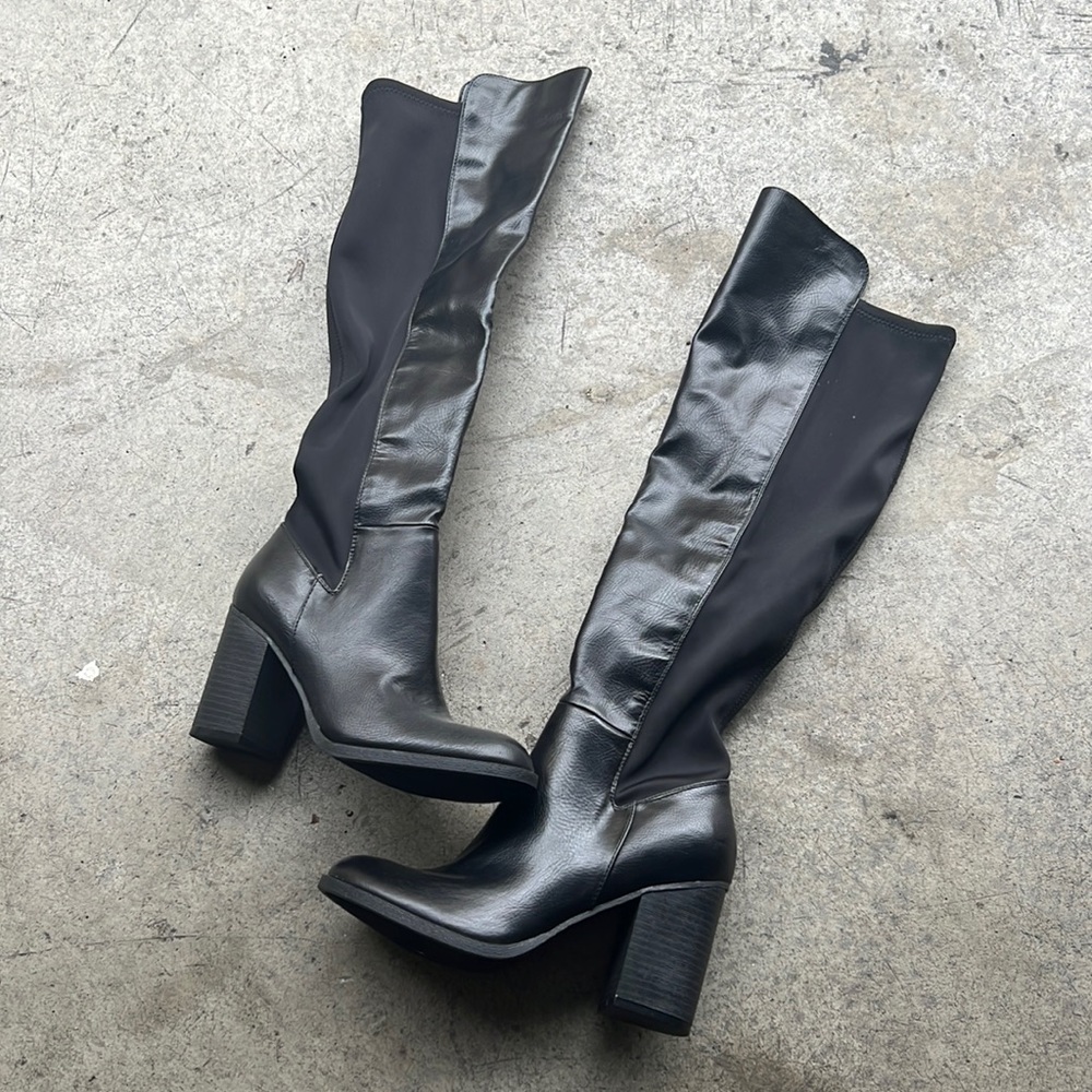 Never worn high knee boots.